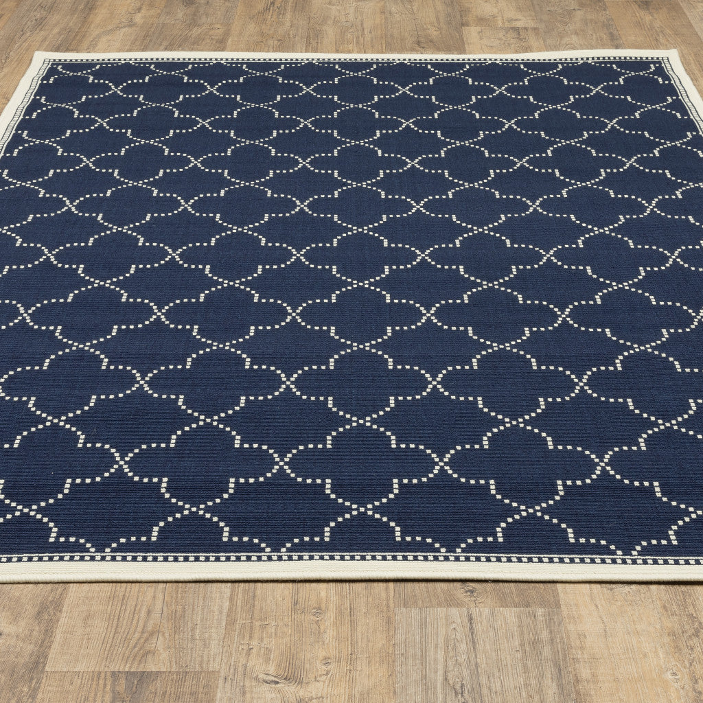 5' x 8' Blue and Ivory Geometric Stain Resistant Indoor Outdoor Area Rug