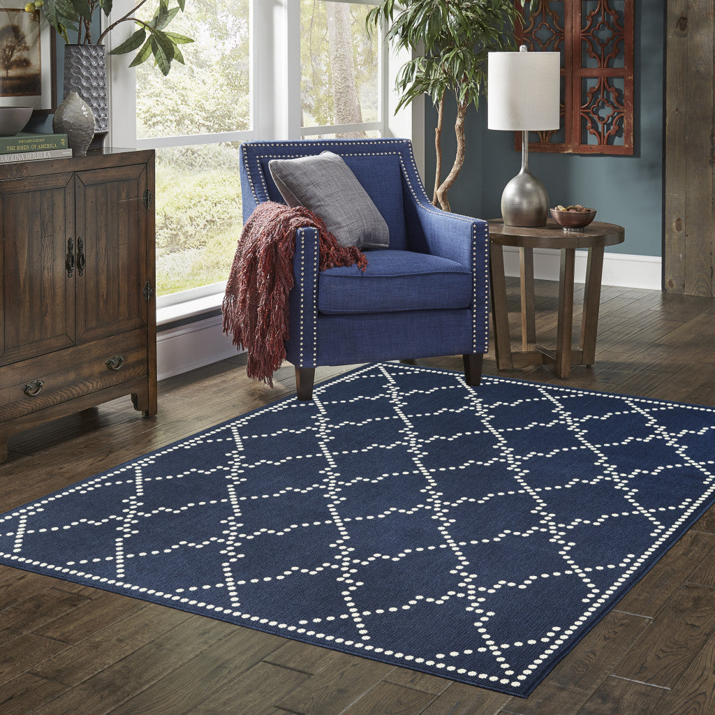 7' x 10' Blue and Ivory Geometric Stain Resistant Indoor Outdoor Area Rug