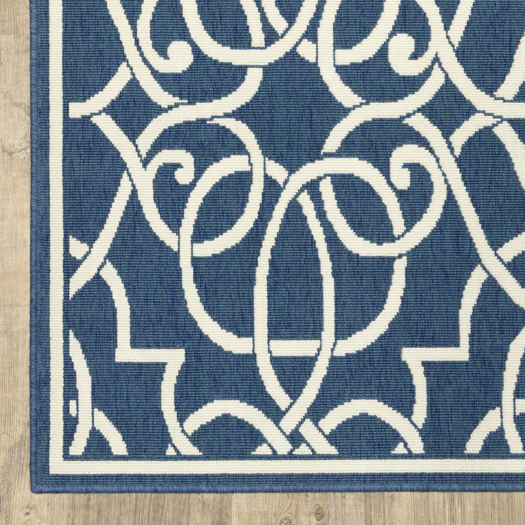 2' X 8' Blue and Ivory Geometric Stain Resistant Indoor Outdoor Area Rug