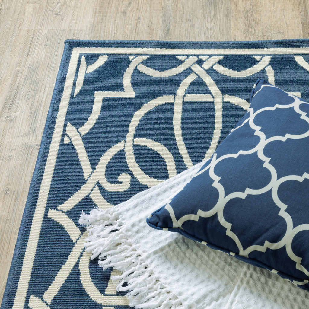 2' X 8' Blue and Ivory Geometric Stain Resistant Indoor Outdoor Area Rug