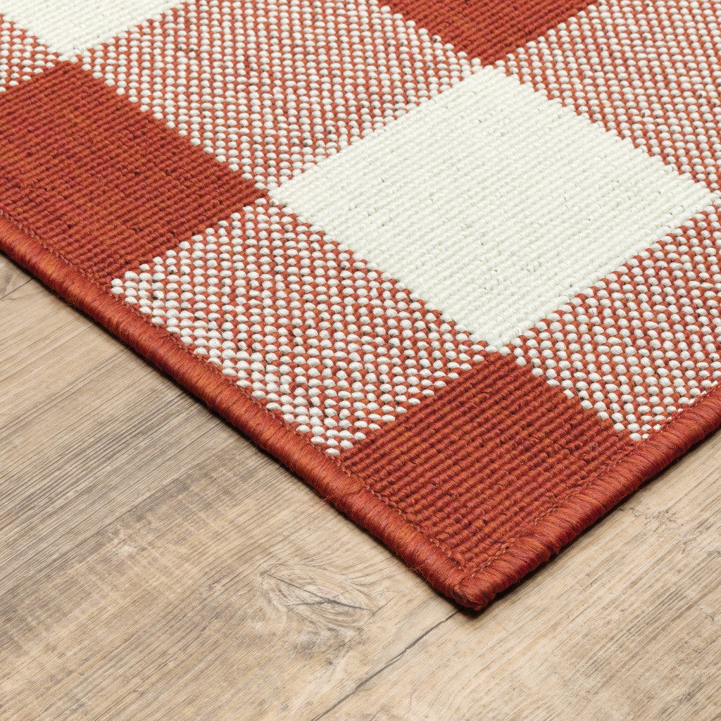 2' X 8' Red and Ivory Geometric Stain Resistant Indoor Outdoor Area Rug