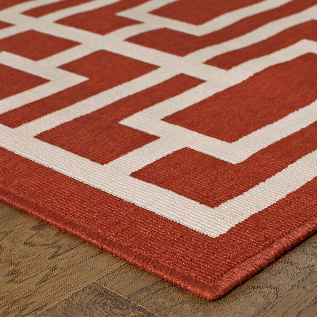 2' x 3' Red and Ivory Geometric Stain Resistant Indoor Outdoor Area Rug