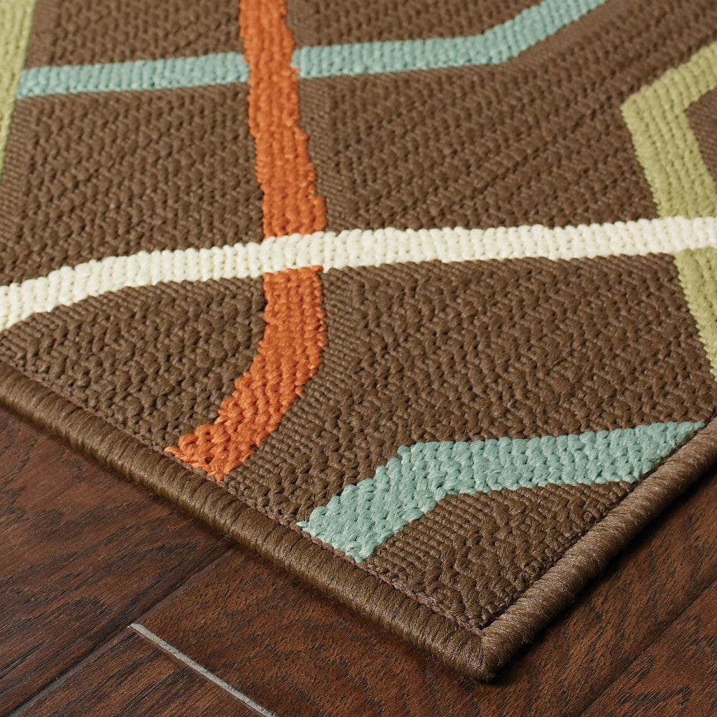 2' X 4' Brown and Ivory Geometric Stain Resistant Indoor Outdoor Area Rug