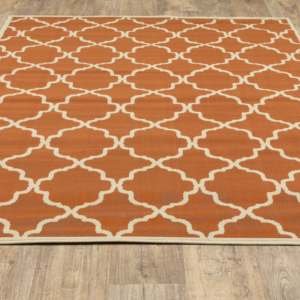 2' X 4' Brown and Ivory Geometric Stain Resistant Indoor Outdoor Area Rug