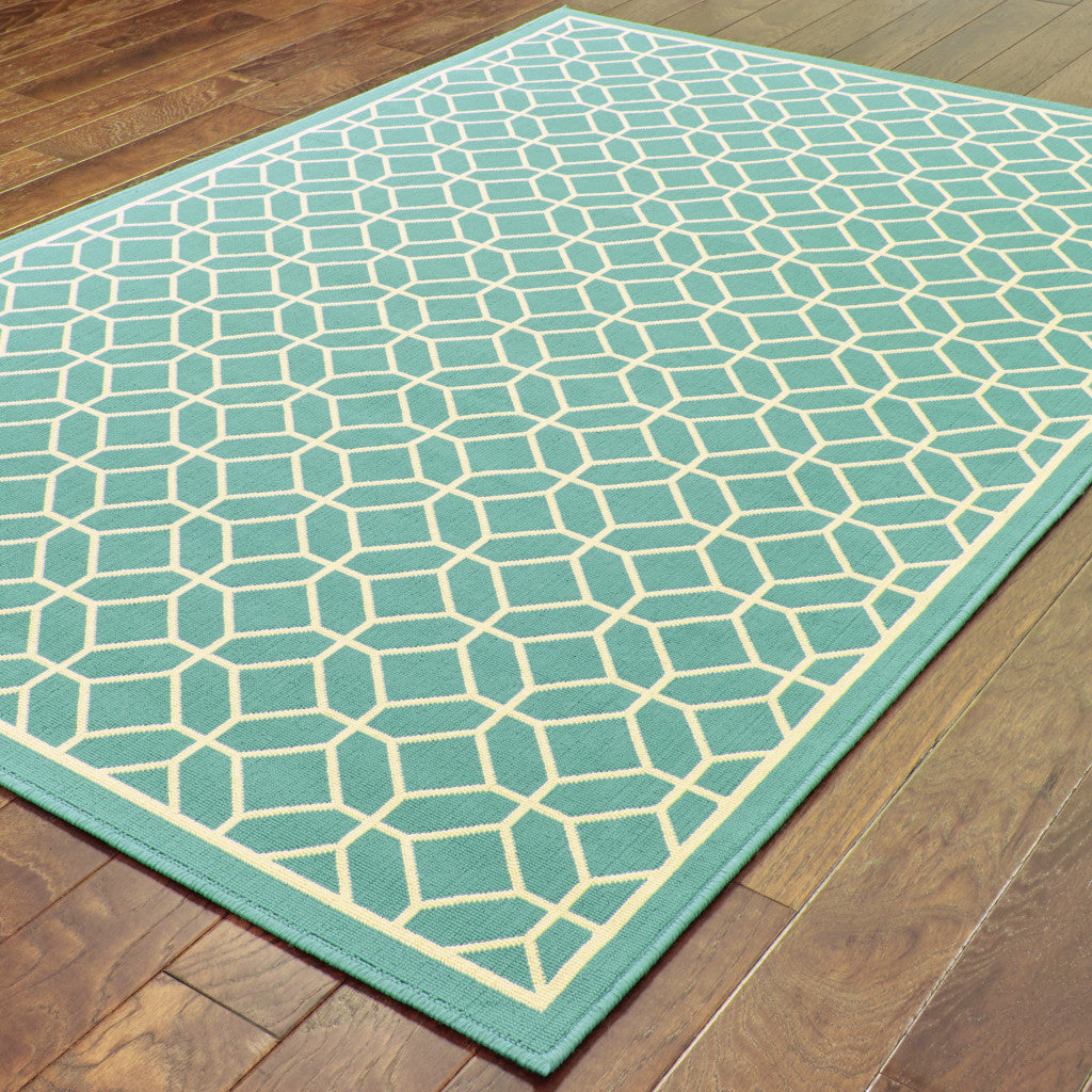 2' X 4' Blue and Ivory Geometric Stain Resistant Indoor Outdoor Area Rug