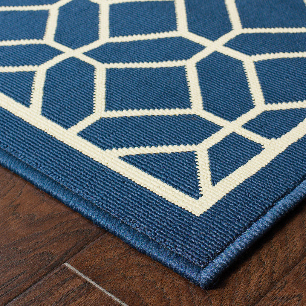 2' X 4' Blue and Ivory Geometric Stain Resistant Indoor Outdoor Area Rug