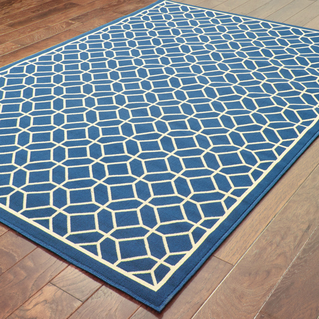 2' X 4' Blue and Ivory Geometric Stain Resistant Indoor Outdoor Area Rug