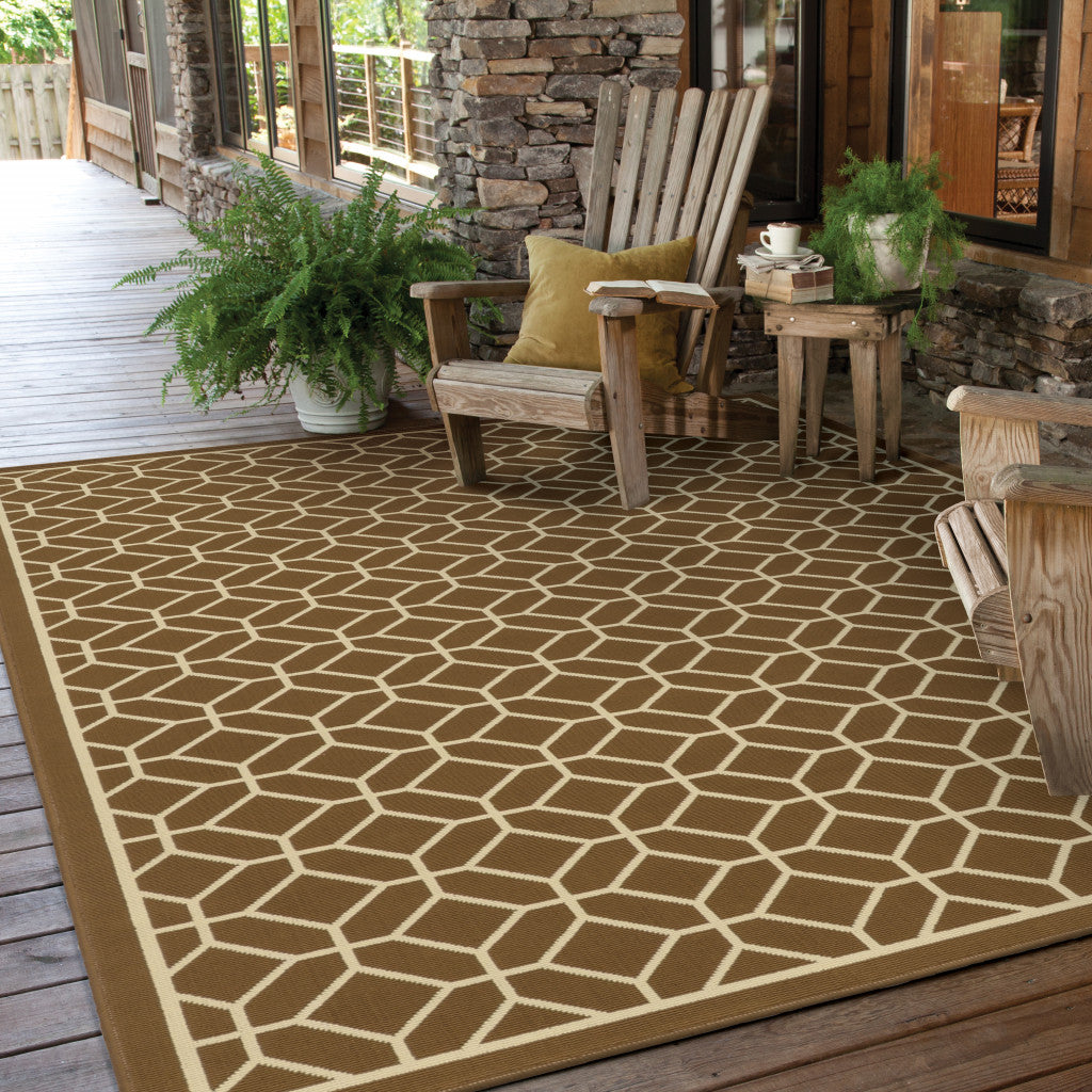 2' X 4' Brown and Ivory Geometric Stain Resistant Indoor Outdoor Area Rug