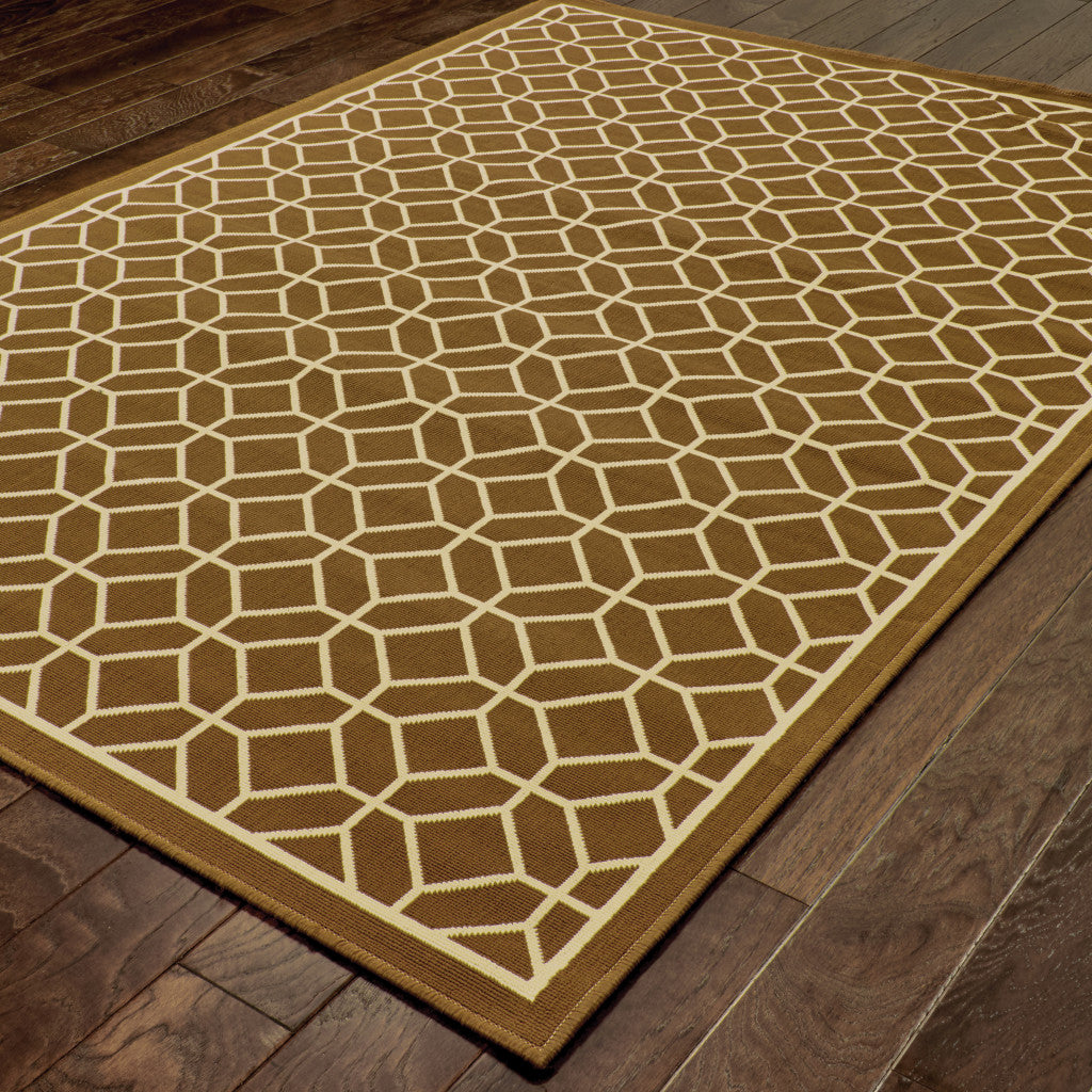 2' X 4' Brown and Ivory Geometric Stain Resistant Indoor Outdoor Area Rug