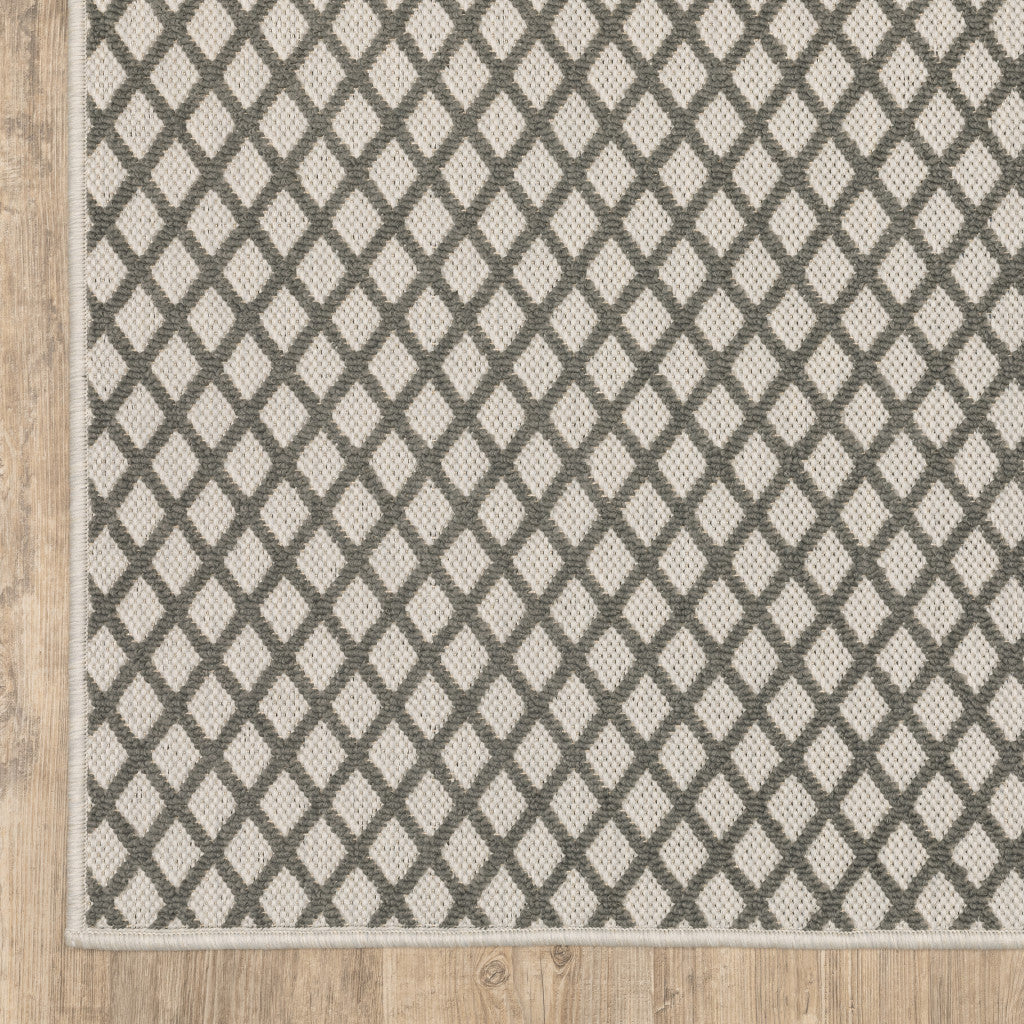 2' X 7' Beige Geometric Stain Resistant Indoor Outdoor Area Rug