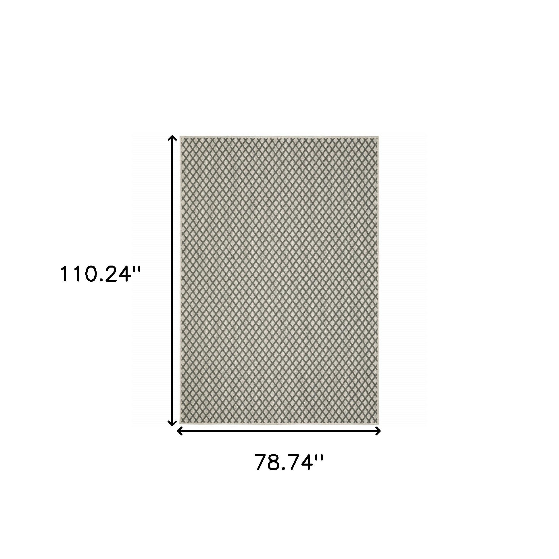 7' x 9' Beige Geometric Stain Resistant Indoor Outdoor Area Rug