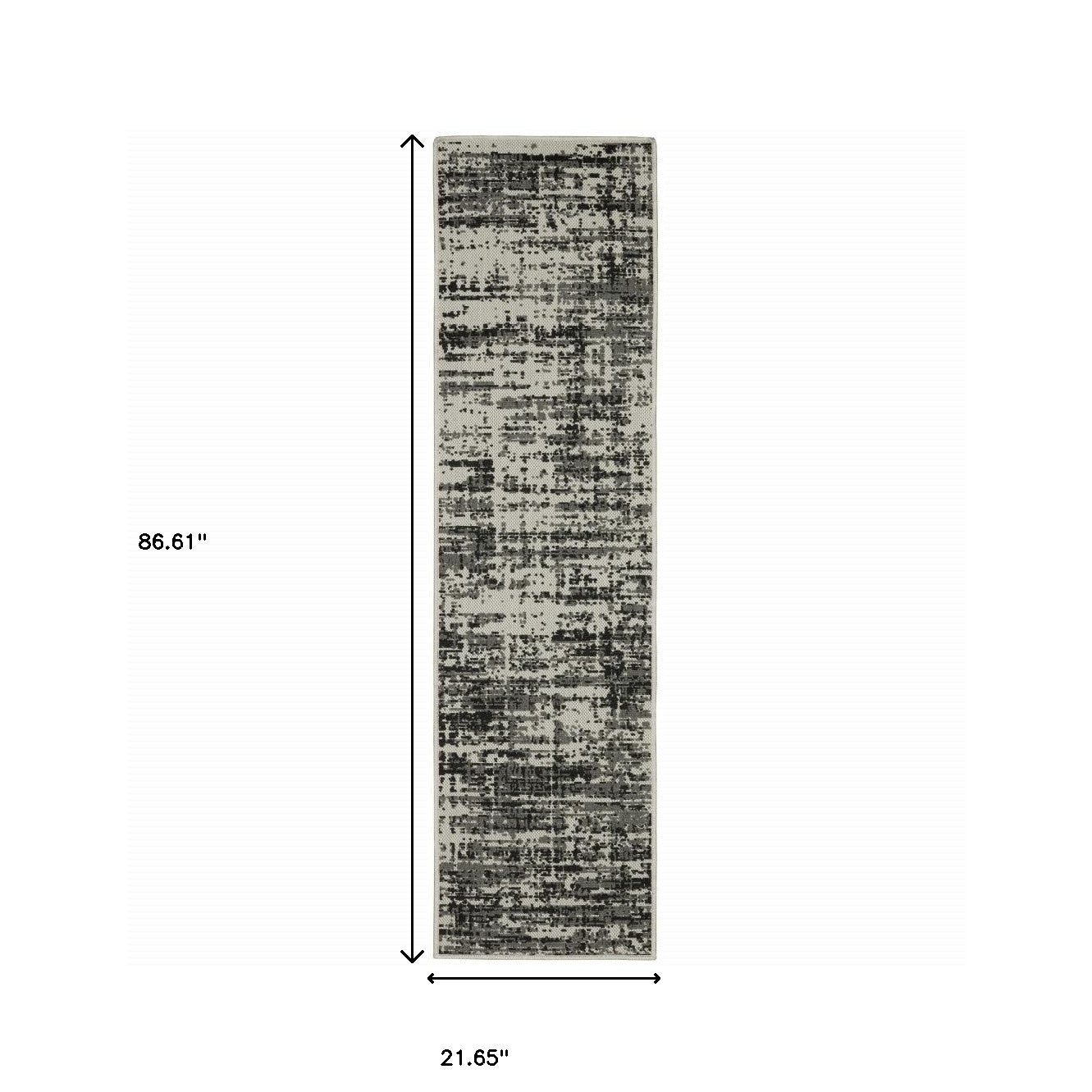 2' X 7' Beige and Black Abstract Stain Resistant Indoor Outdoor Area Rug