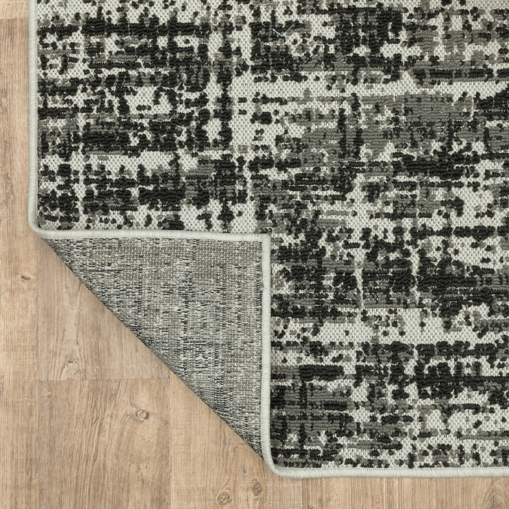 8' x 10' Beige and Black Abstract Stain Resistant Indoor Outdoor Area Rug