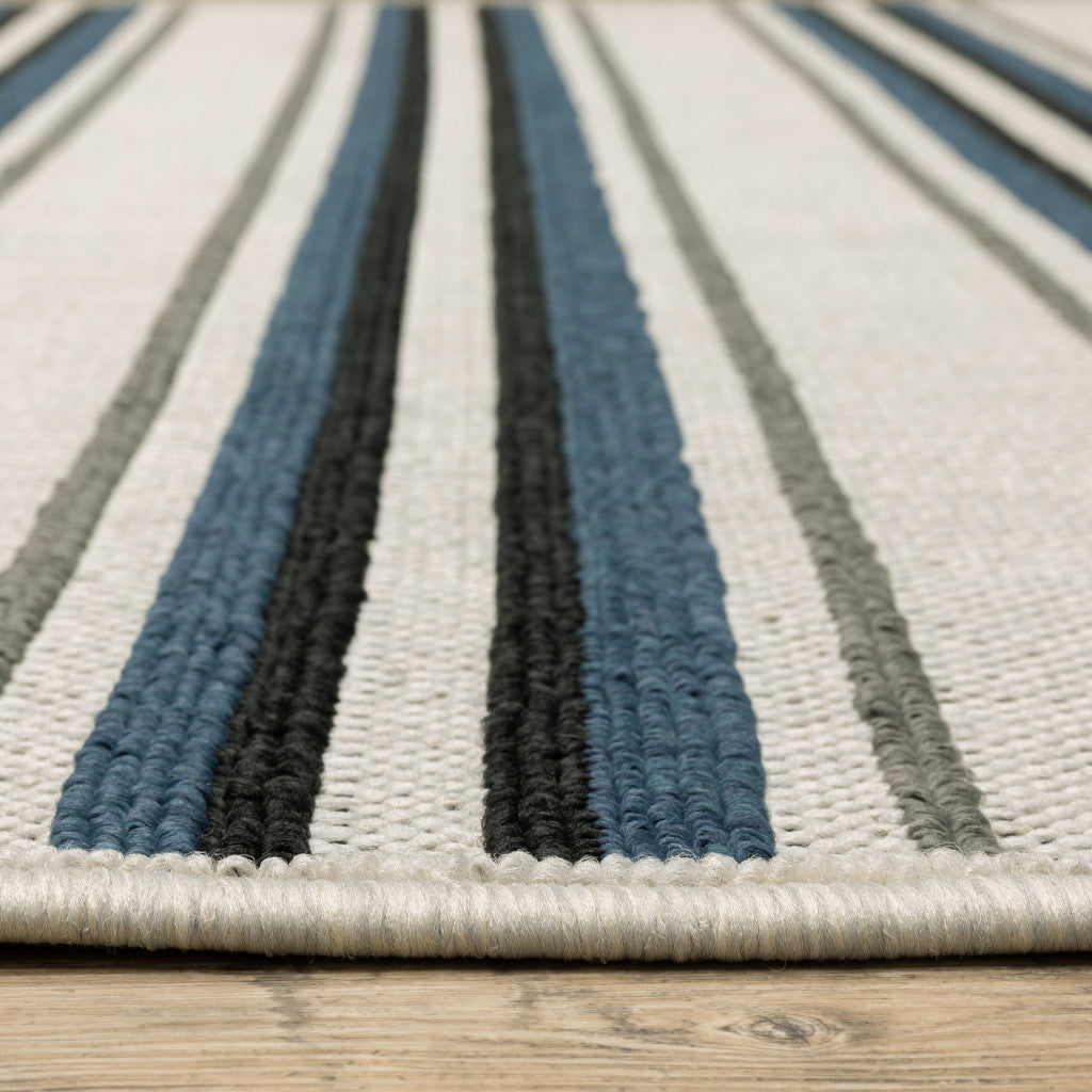 7' x 9' Blue and Beige Geometric Stain Resistant Indoor Outdoor Area Rug