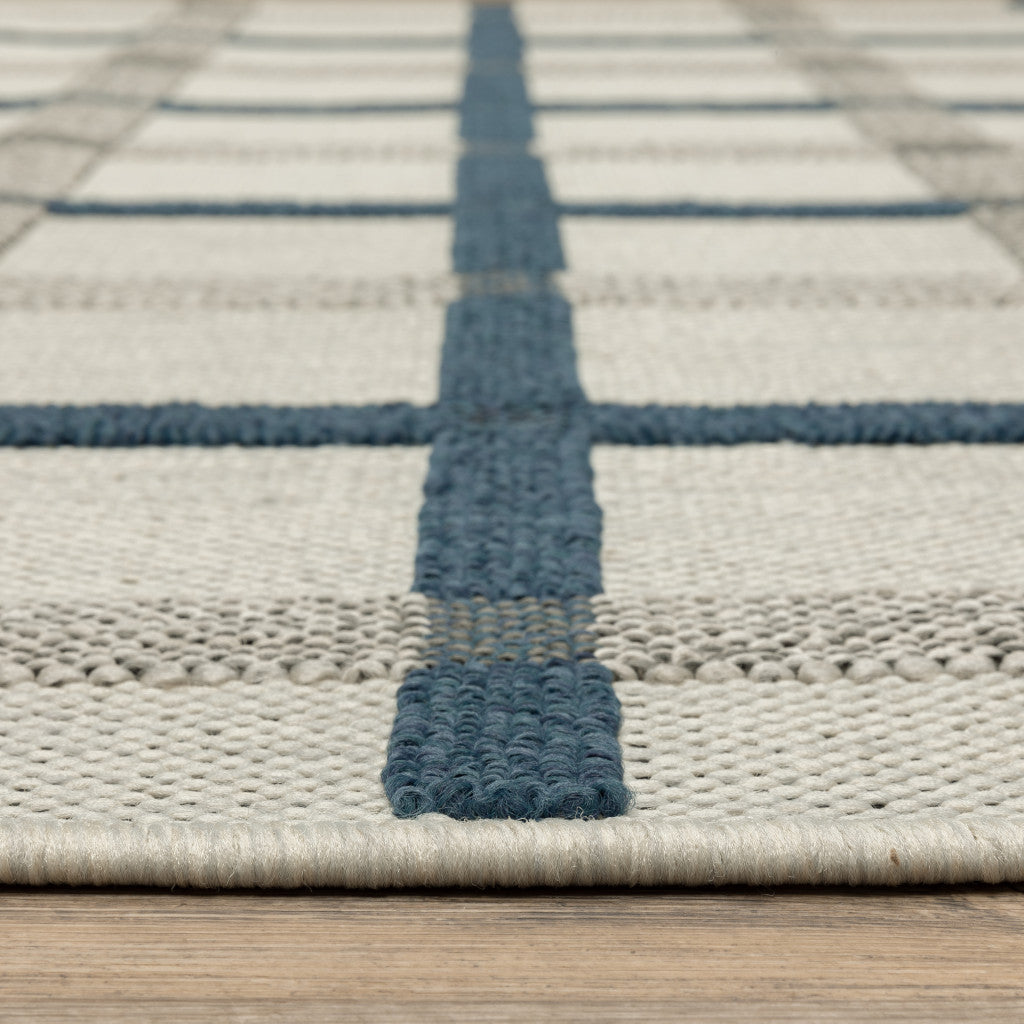 2' X 7' Blue and Beige Geometric Stain Resistant Indoor Outdoor Area Rug