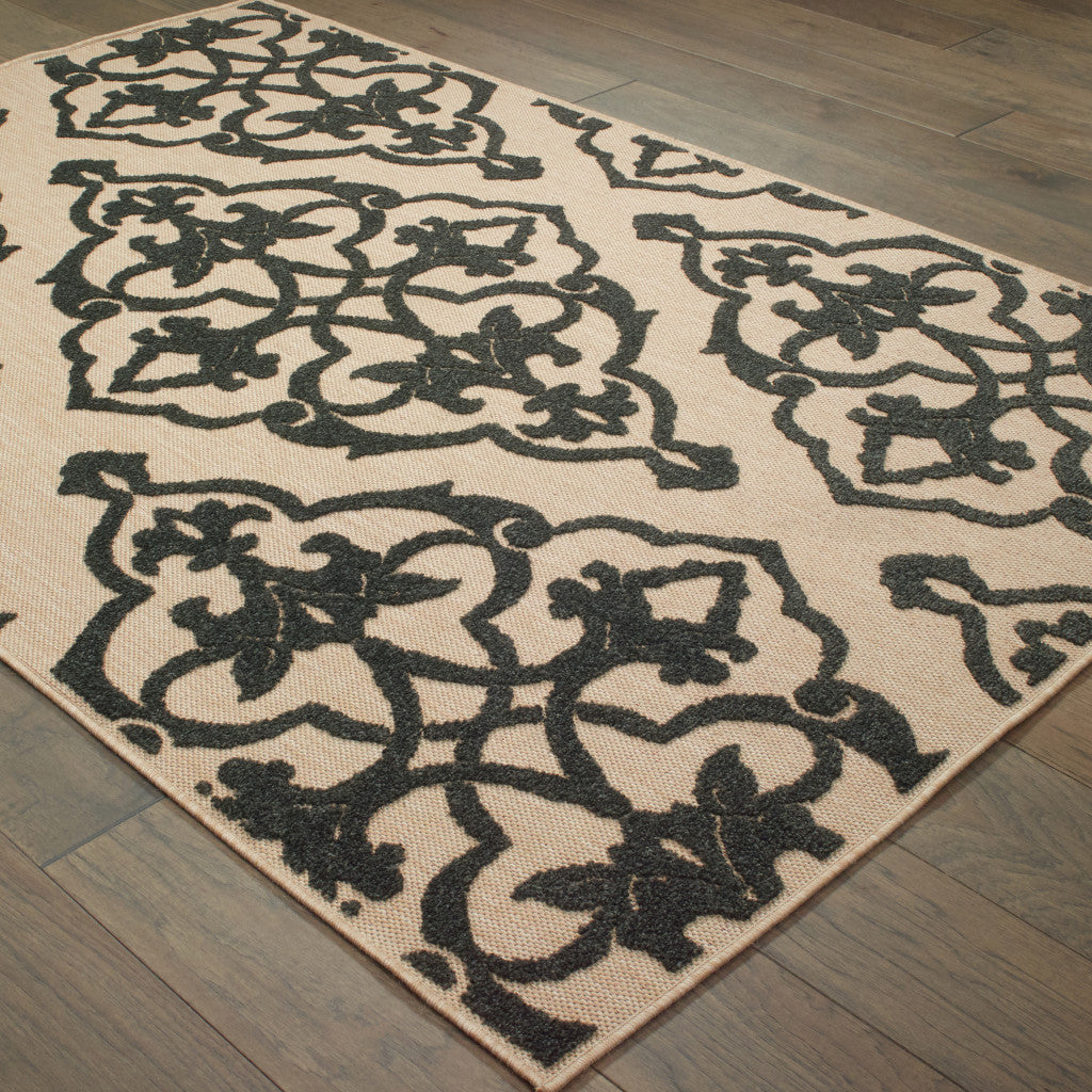 2' x 3' Beige and Black Oriental Stain Resistant Indoor Outdoor Area Rug