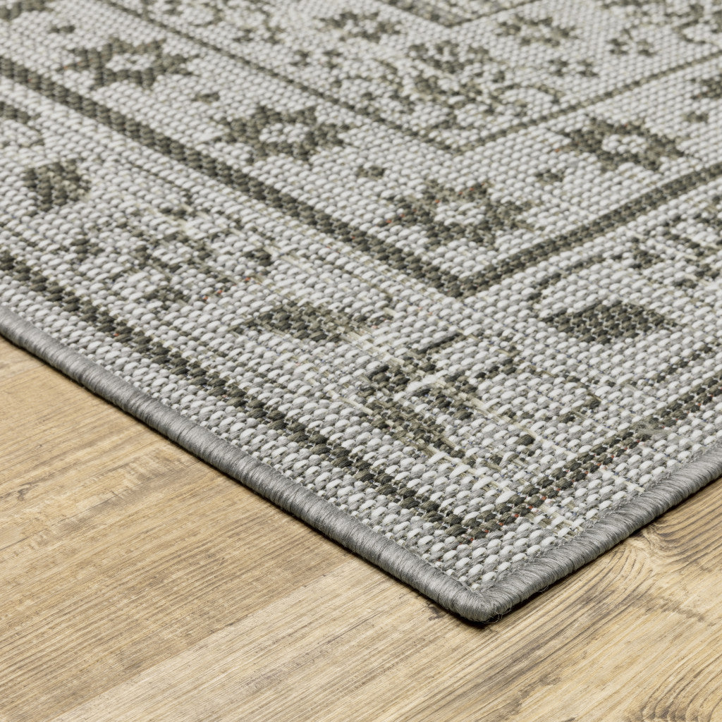 7' x 9' Beige Stain Resistant Indoor Outdoor Area Rug