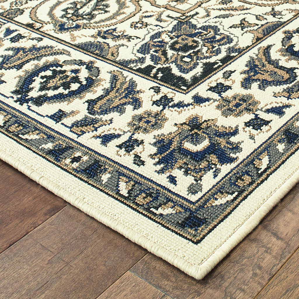 5' x 8' Ivory and Blue Oriental Stain Resistant Indoor Outdoor Area Rug