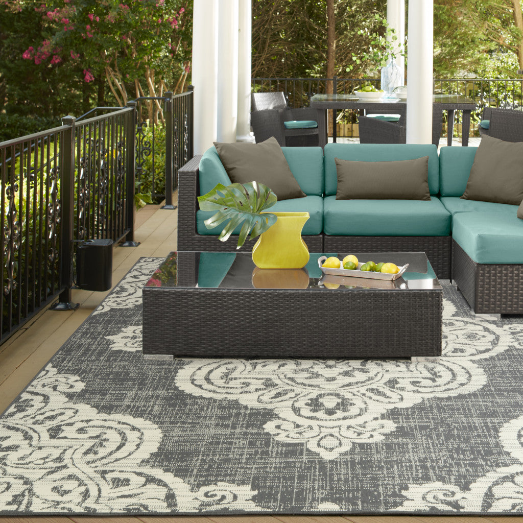 7' x 10' Gray and Ivory Oriental Stain Resistant Indoor Outdoor Area Rug