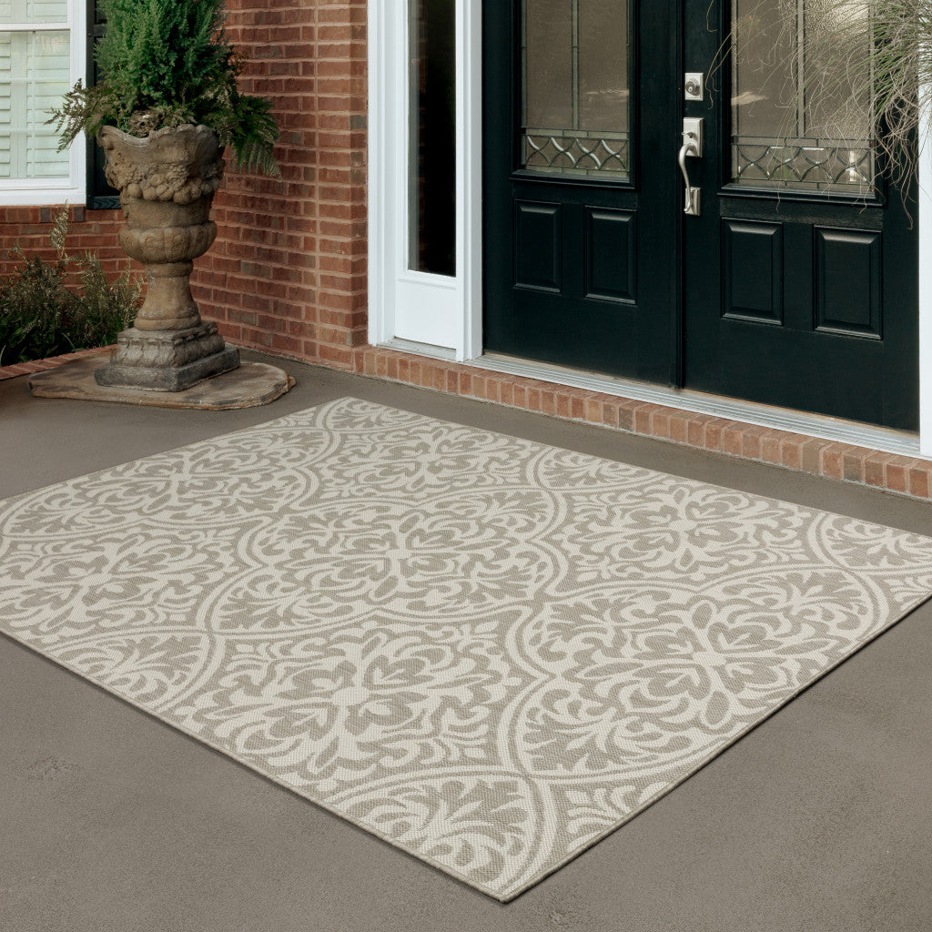 5' x 7' Gray and Ivory Floral Stain Resistant Indoor Outdoor Area Rug