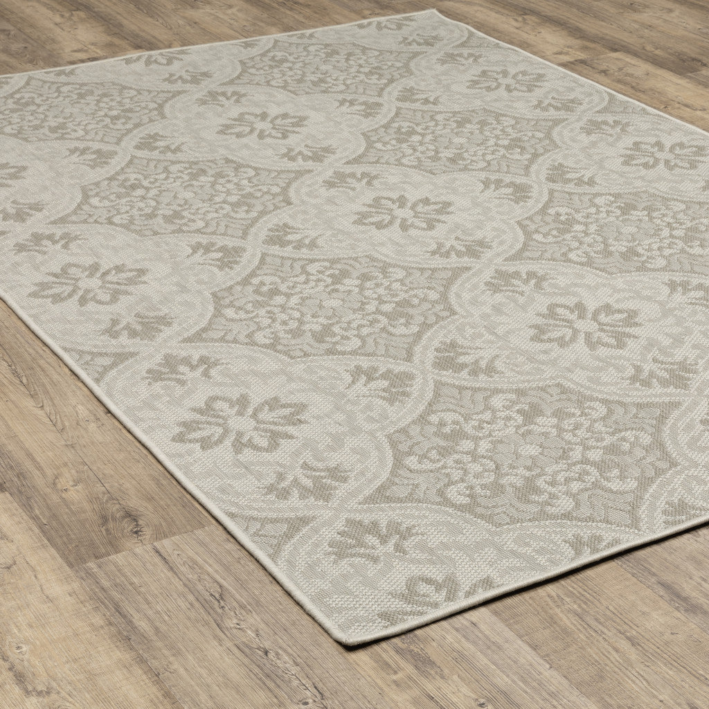 7' x 9' Gray and Ivory Floral Stain Resistant Indoor Outdoor Area Rug