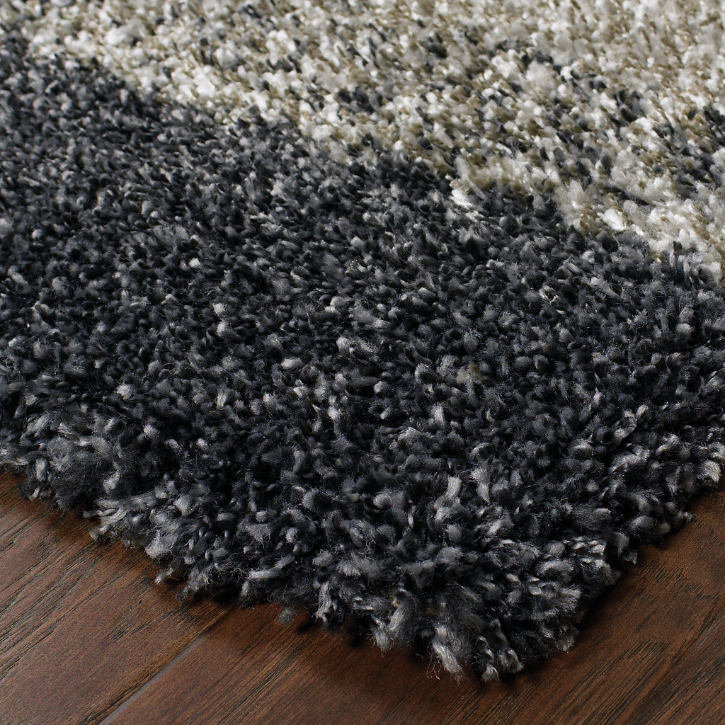 10' X 13' Charcoal Silver And Grey Geometric Shag Power Loom Stain Resistant Area Rug