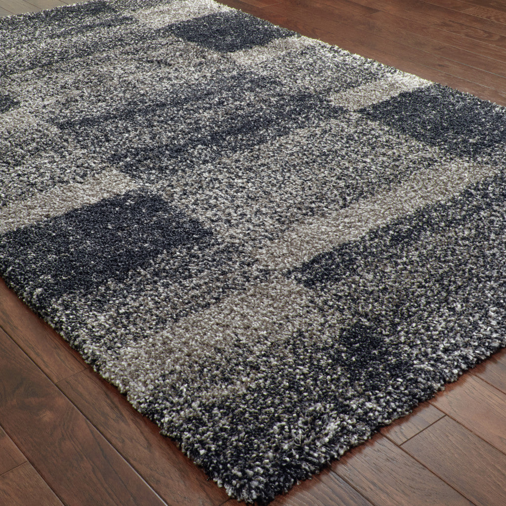 10' X 13' Charcoal Silver And Grey Geometric Shag Power Loom Stain Resistant Area Rug