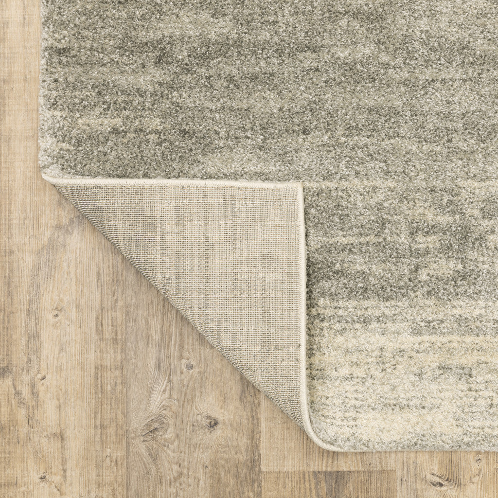 10' X 13' Grey Beige And Tan Abstract Power Loom Stain Resistant Area Rug