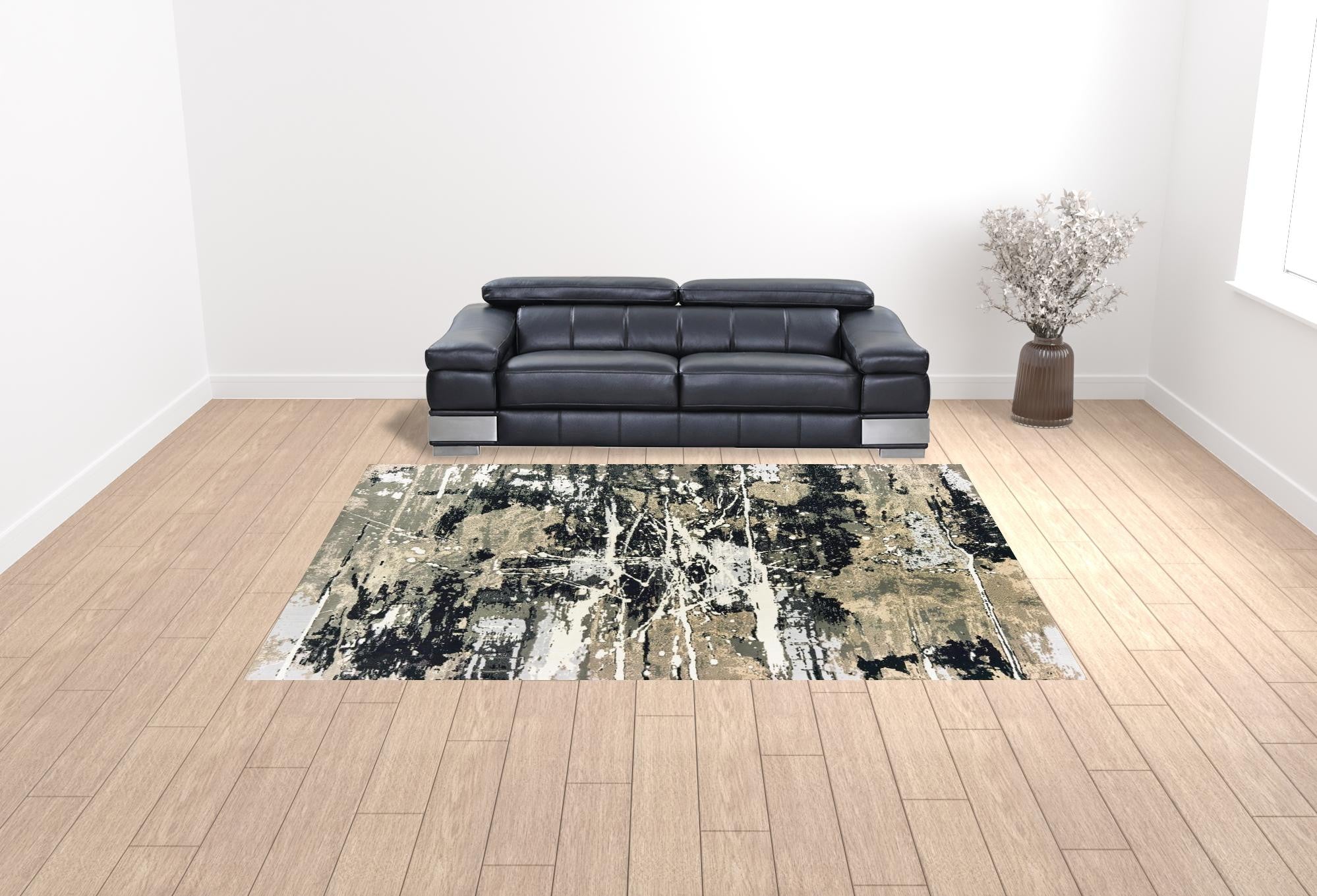 10' X 13' Black Gold Grey And Ivory Abstract Power Loom Stain Resistant Area Rug