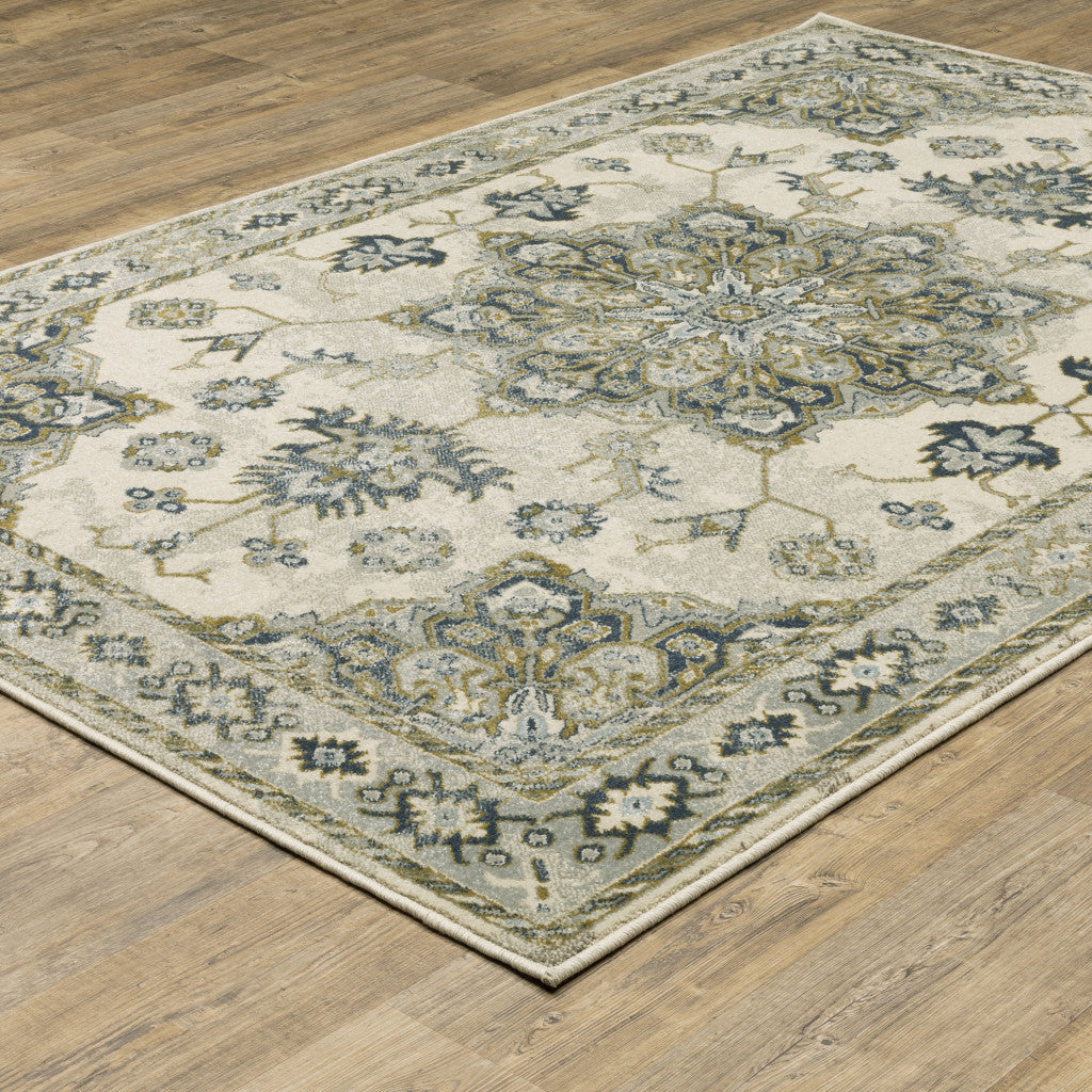 10' X 13' Ivory Blue Teal Grey And Olive Green Oriental Power Loom Stain Resistant Area Rug