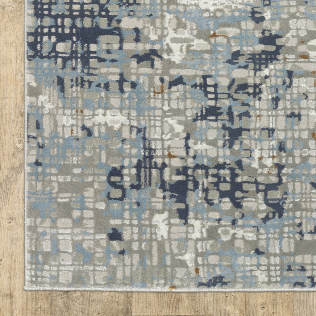 10' X 13' Blue Ivory Grey Brown Beige And Light Blue Abstract Power Loom Stain Resistant Area Rug