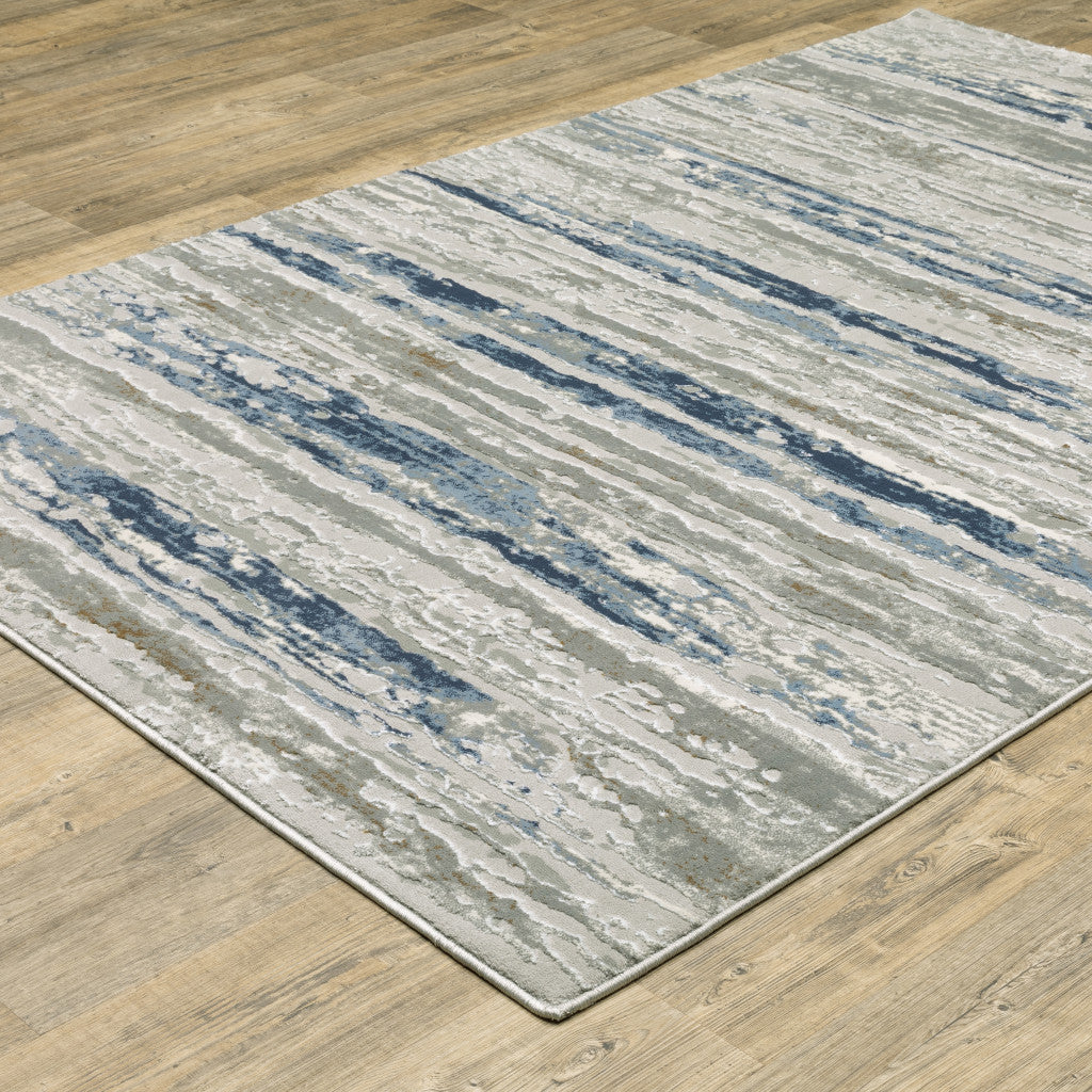 10' X 13' Blue Ivory Grey Light Blue And Brown Abstract Power Loom Stain Resistant Area Rug