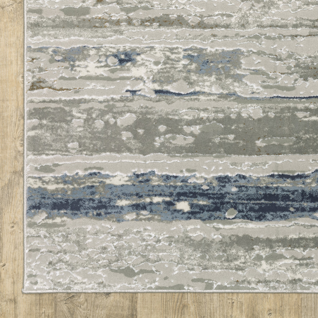 10' X 13' Blue Ivory Grey Light Blue And Brown Abstract Power Loom Stain Resistant Area Rug