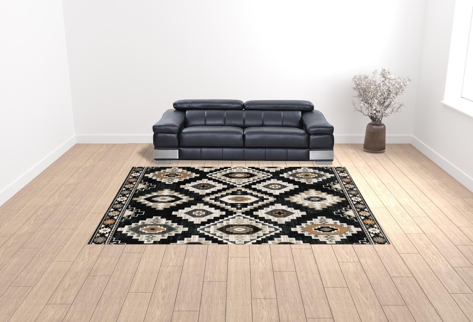 10' X 13' Black Grey Tan Orange And Ivory Southwestern Power Loom Stain Resistant Area Rug