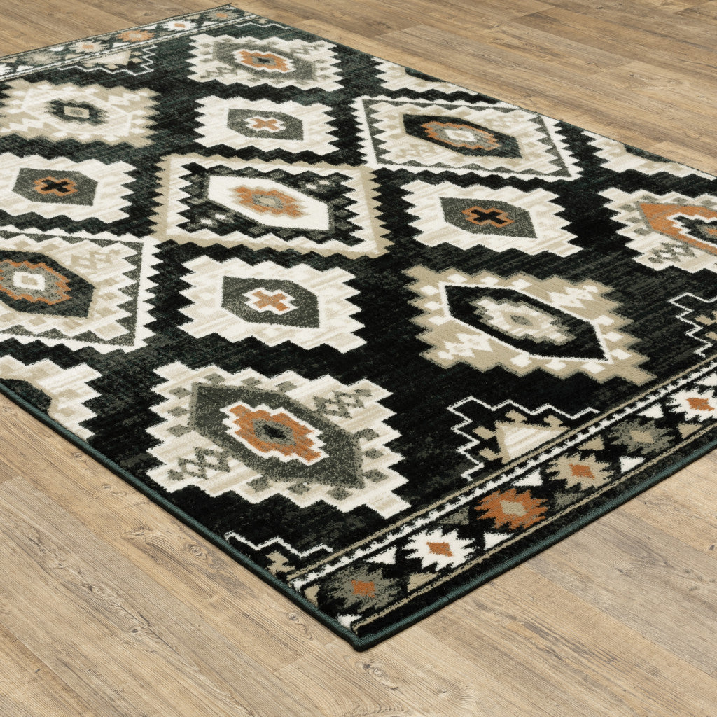 10' X 13' Black Grey Tan Orange And Ivory Southwestern Power Loom Stain Resistant Area Rug