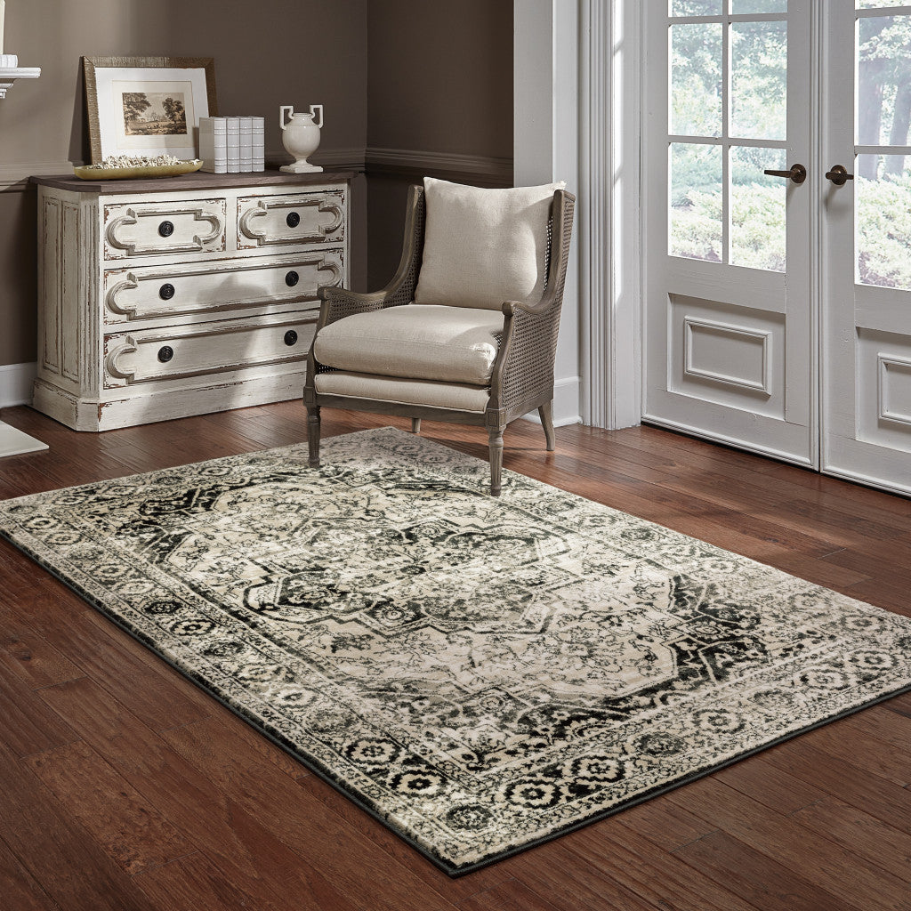 10' X 13' Black Grey Tan And Ivory Oriental Power Loom Stain Resistant Area Rug