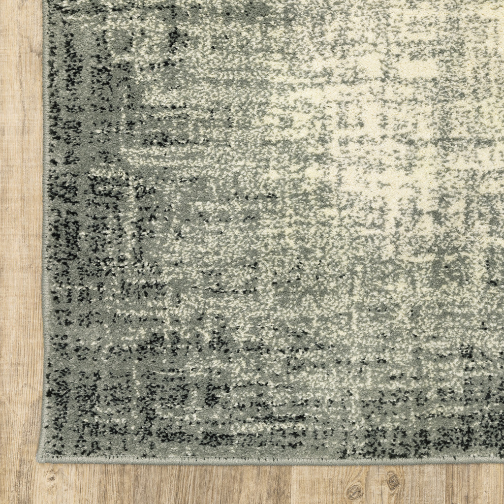 10' X 13' Grey Beige And Blue Power Loom Stain Resistant Area Rug