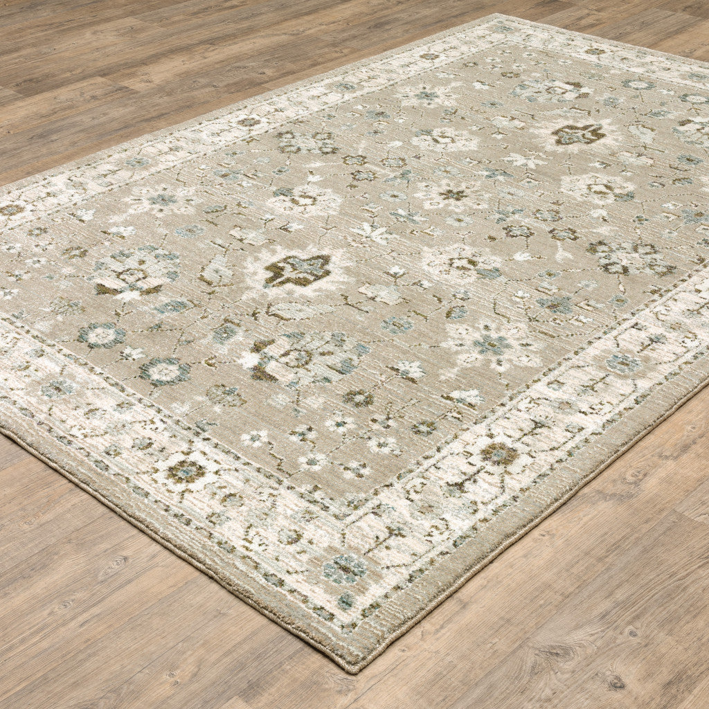 10' X 13' Beige Ivory Blue Green And Purple Oriental Power Loom Stain Resistant Area Rug