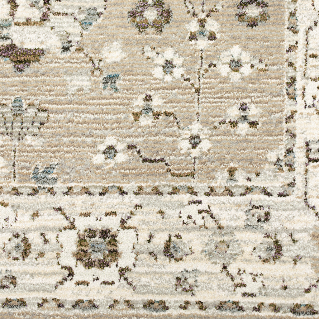 10' X 13' Beige Ivory Blue Green And Purple Oriental Power Loom Stain Resistant Area Rug