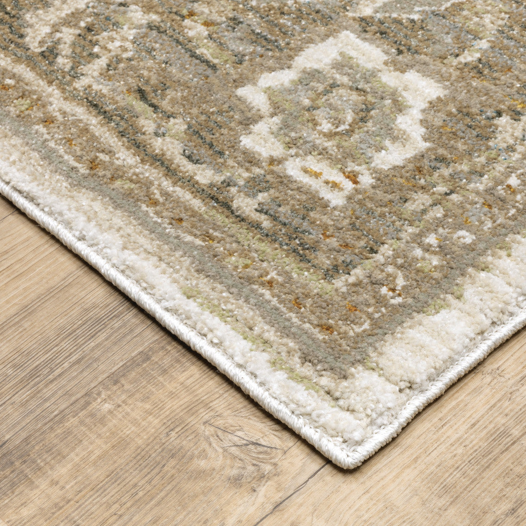 10' X 13' Beige Ivory Tan Gold Grey And Green Oriental Power Loom Stain Resistant Area Rug