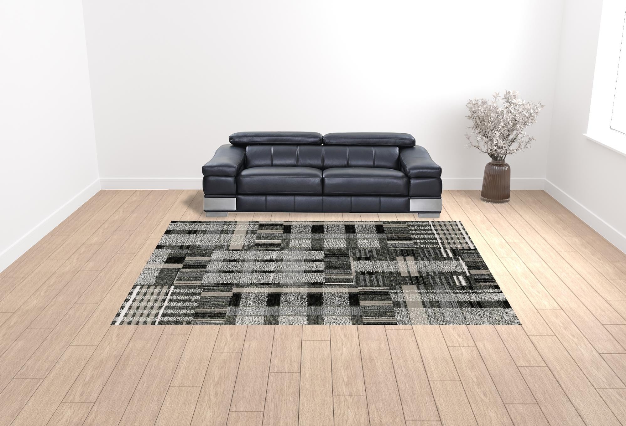 10' X 13' Black Grey And Ivory Geometric Power Loom Stain Resistant Area Rug