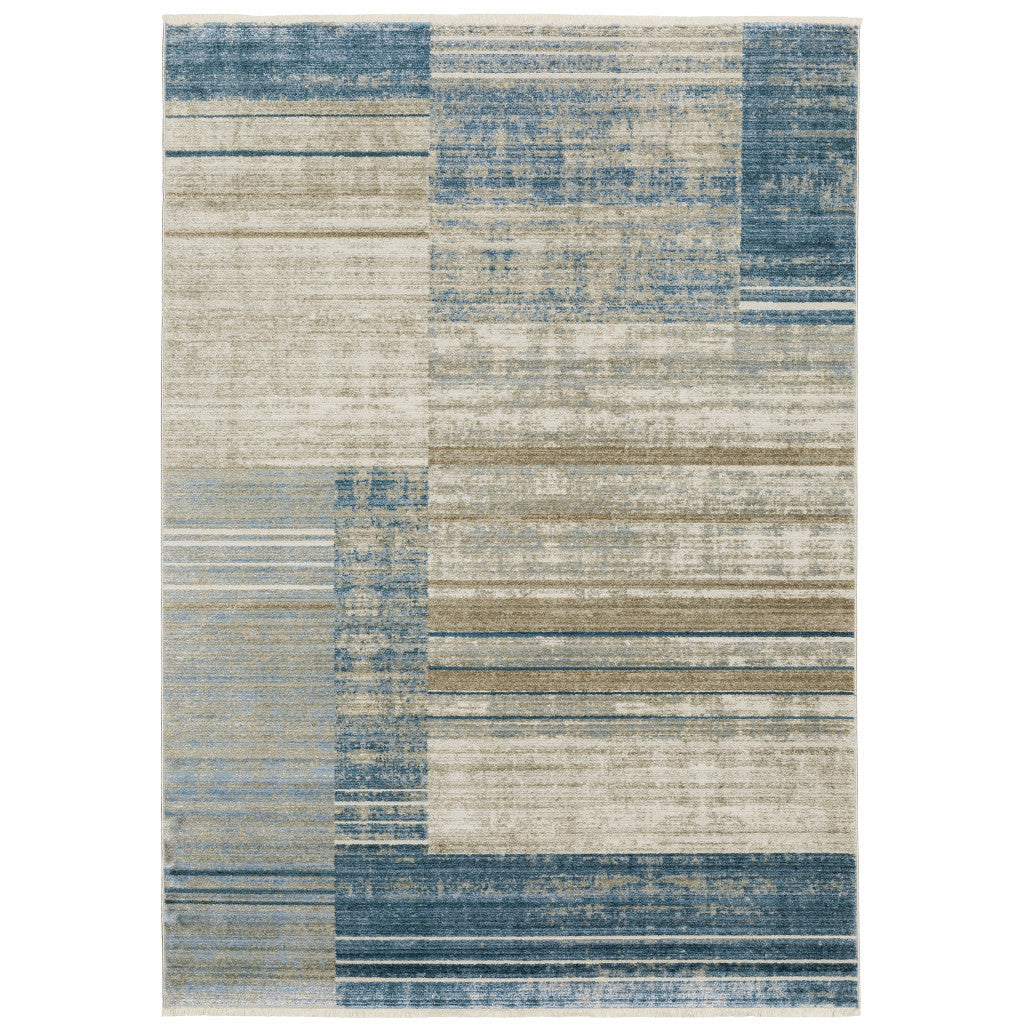 10' X 13' Blue Dark Blue Teal Grey Ivory Beige And Tan Geometric Power Loom Stain Resistant Area Rug With Fringe