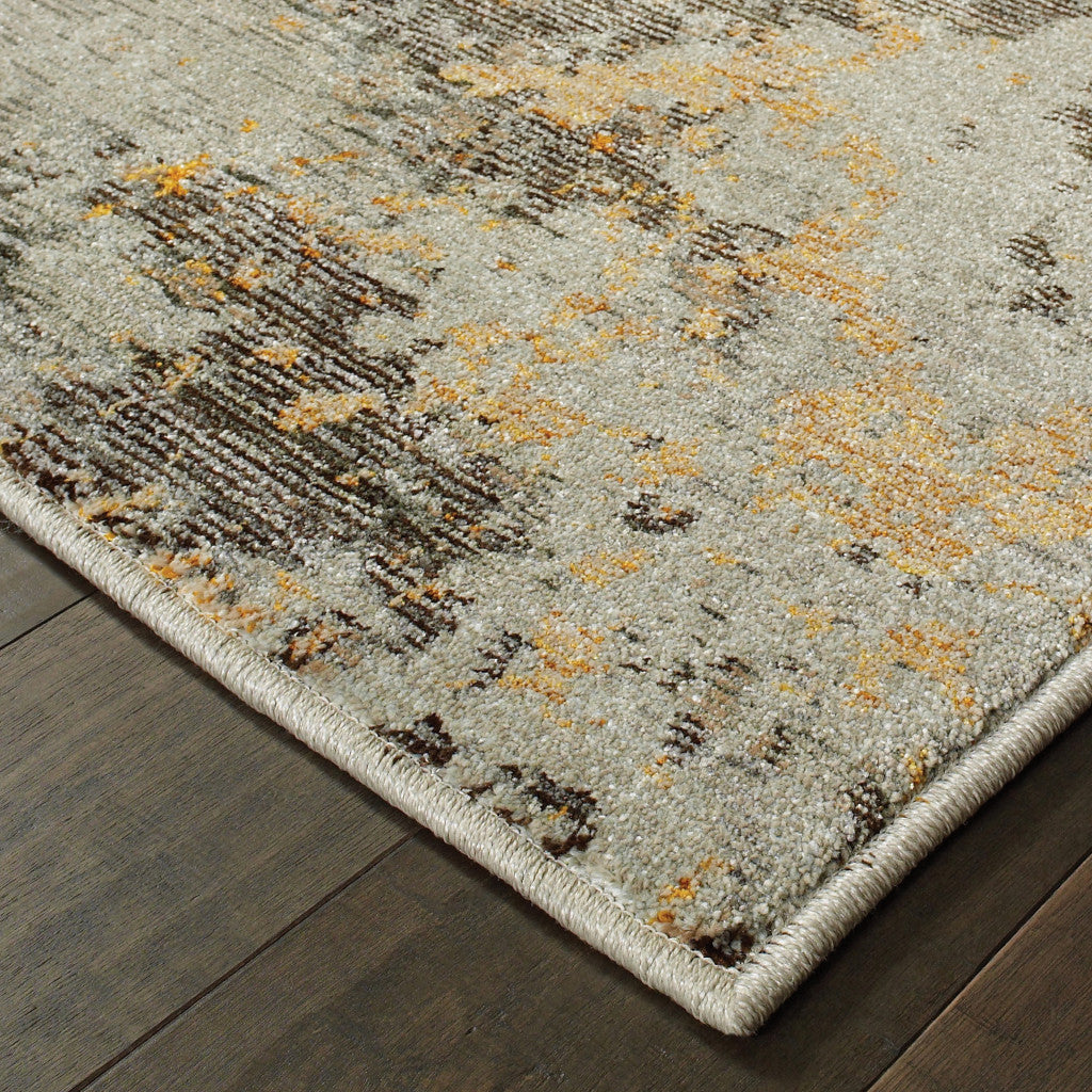 10' X 13' Grey And Gold Abstract Power Loom Stain Resistant Area Rug