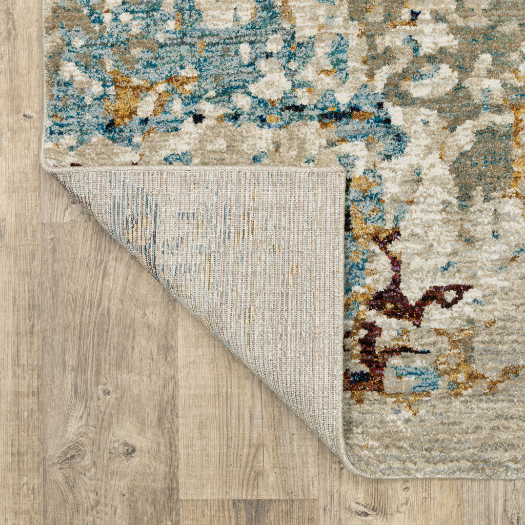 10' X 13' Beige And Blue Abstract Power Loom Stain Resistant Area Rug