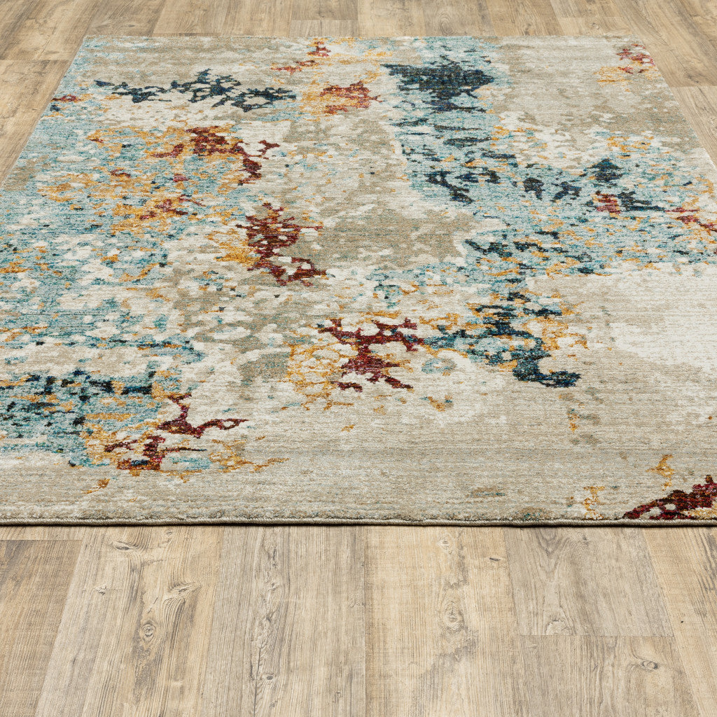 10' X 13' Beige And Blue Abstract Power Loom Stain Resistant Area Rug