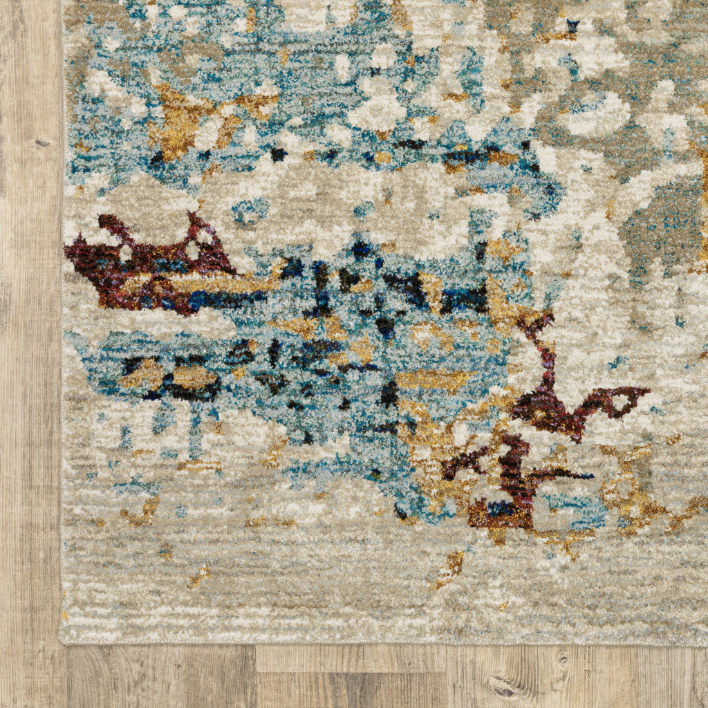 10' X 13' Beige And Blue Abstract Power Loom Stain Resistant Area Rug