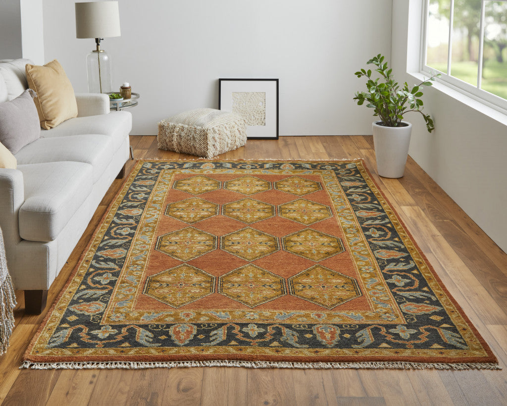 5' X 8' Tan Orange And Brown Wool Floral Hand Knotted Stain Resistant Area Rug