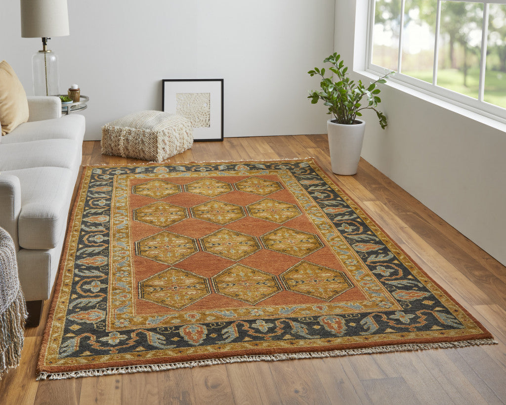 5' X 8' Tan Orange And Brown Wool Floral Hand Knotted Stain Resistant Area Rug