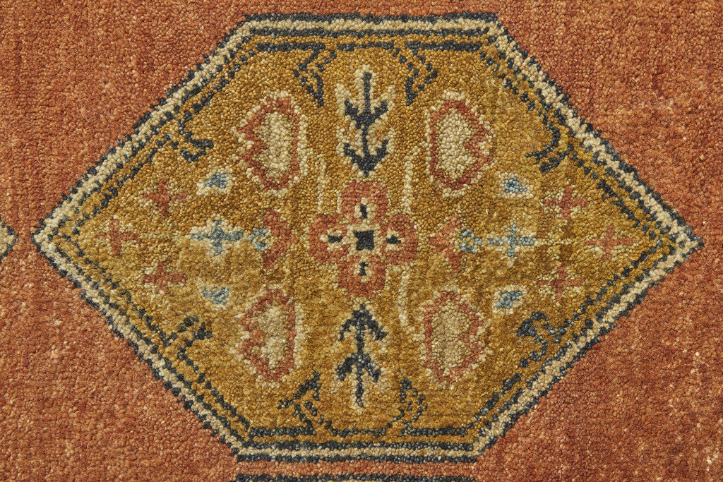 5' X 8' Tan Orange And Brown Wool Floral Hand Knotted Stain Resistant Area Rug