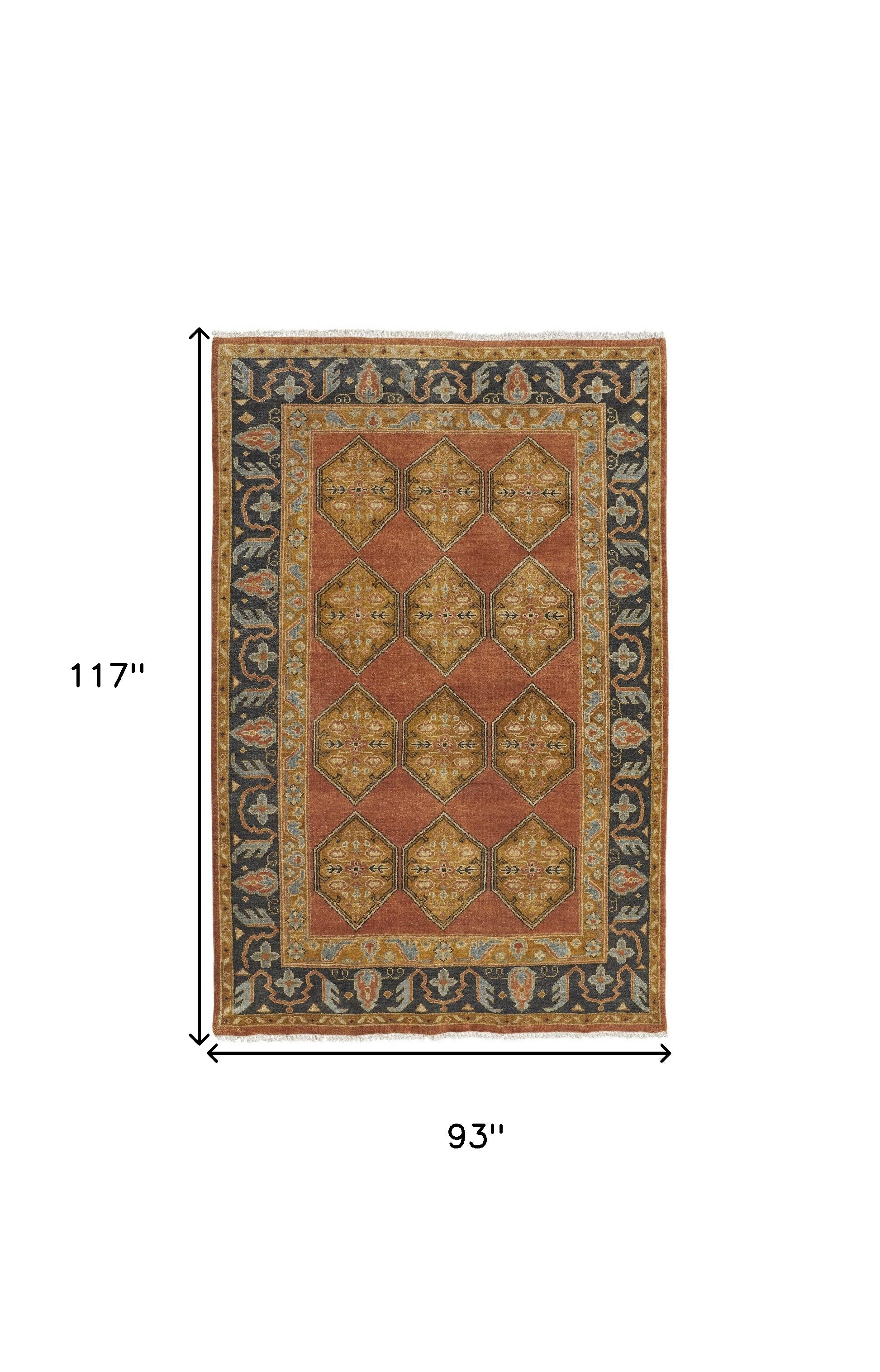 8' X 10' Tan Orange And Brown Wool Floral Hand Knotted Stain Resistant Area Rug